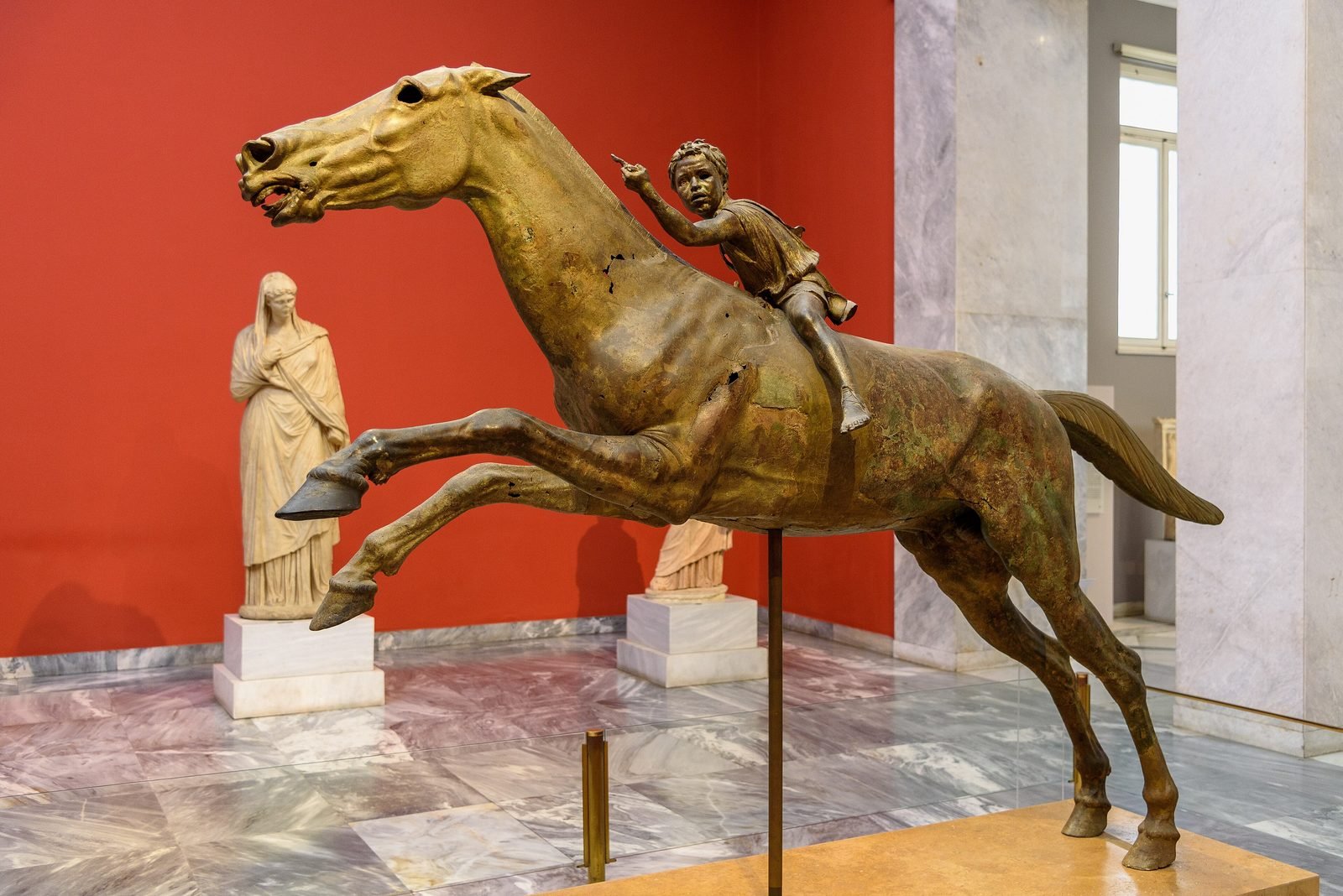 A bronze boy on a galloping horse, pulled out of a shipwreck off Cape Artemision, Greece, and made about 150 BC. When I visit the National Archaeological Museum in Athens, one of the biggest crowds in the museum is gathered around this statue. What makes this discovery so crowd-pleasing, and what more can we learn from shipwrecks? In this lesson the best shipwreck to look at is one nearing the end of the Bronze Age, filled with the basics — which seem boring beside this racing jockey. But the Uluburun shipwreck is legendary in a different way.